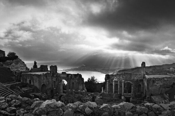 Taormina and snow-capped Mount Etna